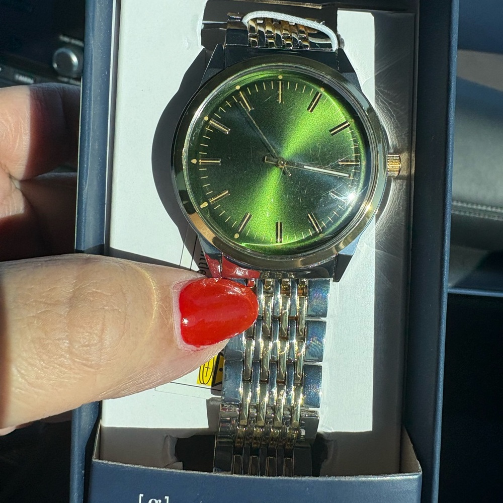 Elegant Green and Gold Watch